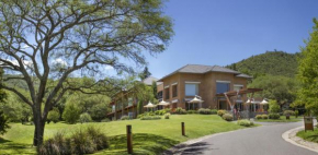 Гостиница Altos de Belgrano Hotel Cabañas Golf y Spa  Вилла Генерал Белграно